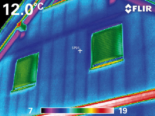Thermal imaging of exterior building facade showing normal window and wall temperature patterns, FLIR thermal camera building inspection NZ